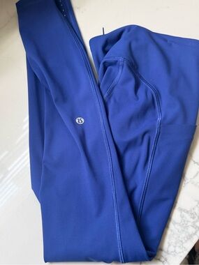 Lululemon Fast & Free 7/8 Tights are made of Nulux fabric 25”